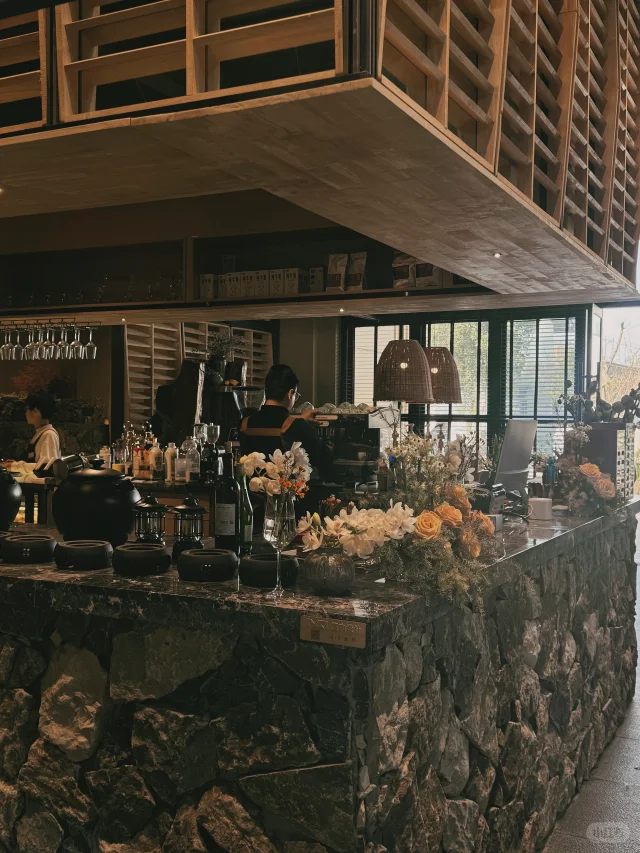 The inviting exterior of Yifang Cafe, nestled in Shifang's Chengdong Village.